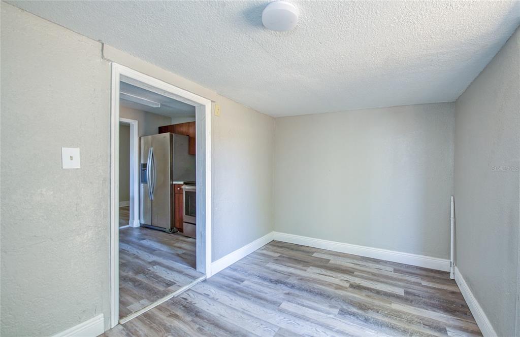 1516 East Waters Avenue Tampa, FL 33604 - Photo 13 of 25 a view of hallway with wooden floor