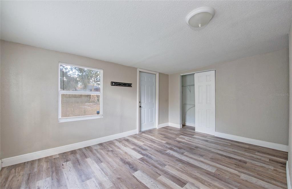 1516 East Waters Avenue Tampa, FL 33604 - Photo 15 of 25 a view of room window and wooden floor