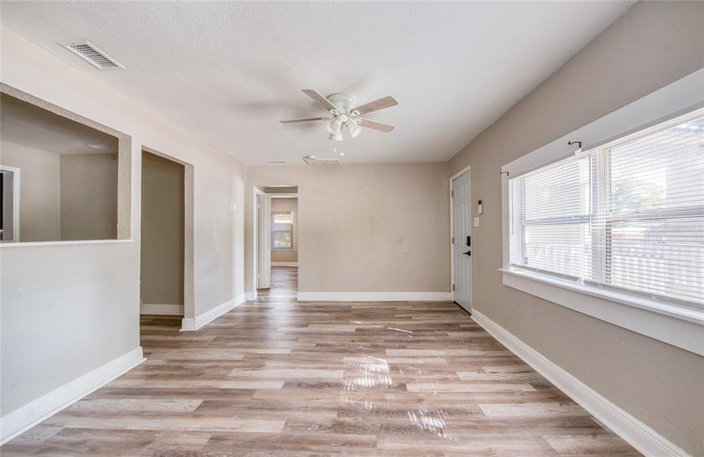 1516 East Waters Avenue Tampa, FL 33604 - Photo 5 of 25 a view of an empty room with a window