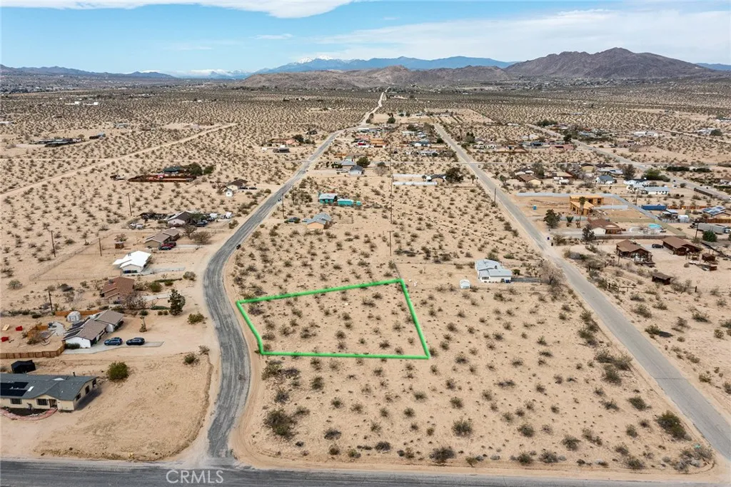 0 4th Street South Joshua Tree, CA 92252 - Photo 3 of 16 a view of a city and a mountain