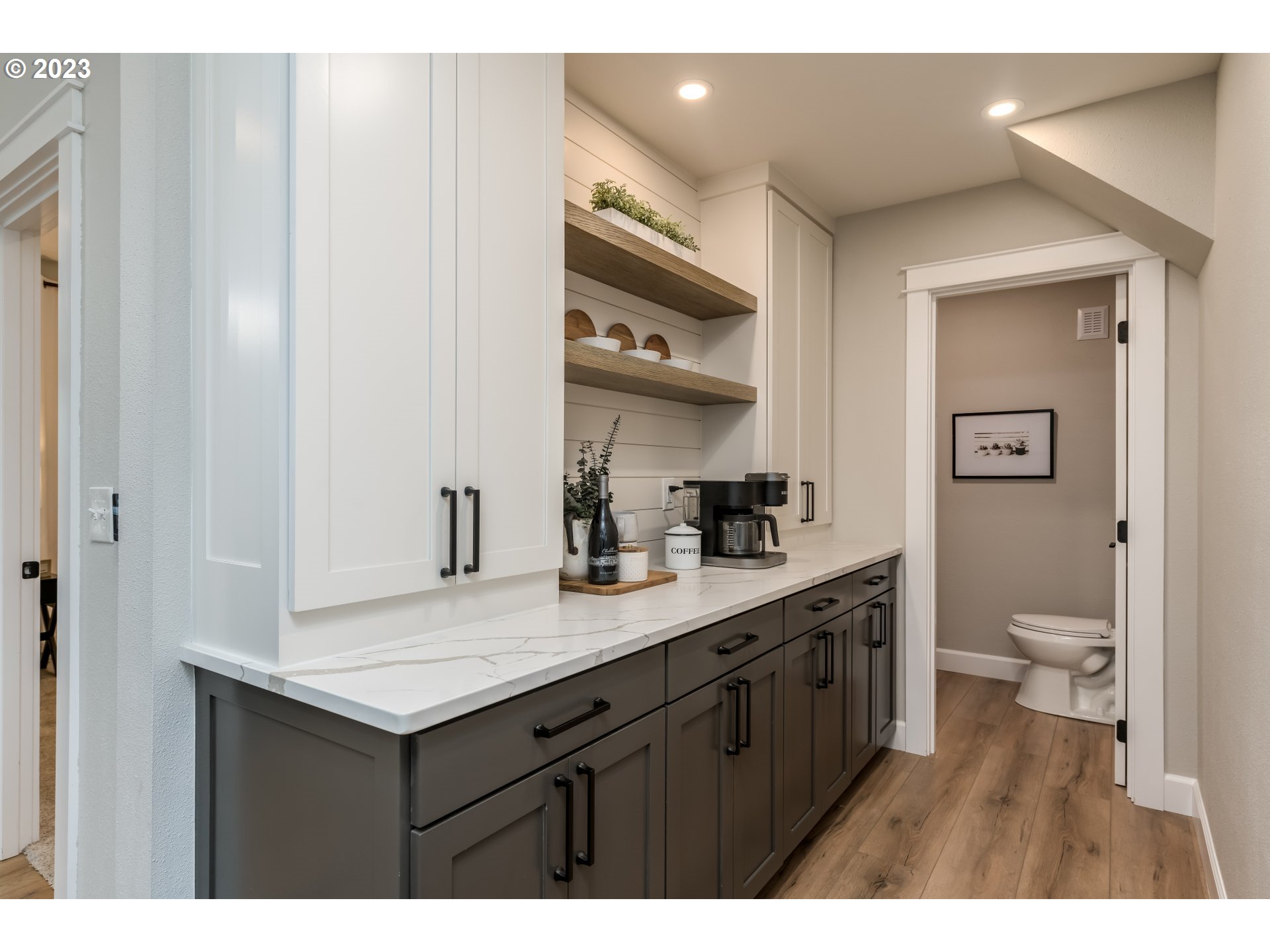 8951 South Schneider Road Canby, OR 97013 - Photo 13 of 39 a bathroom with a sink a toilet and a mirror