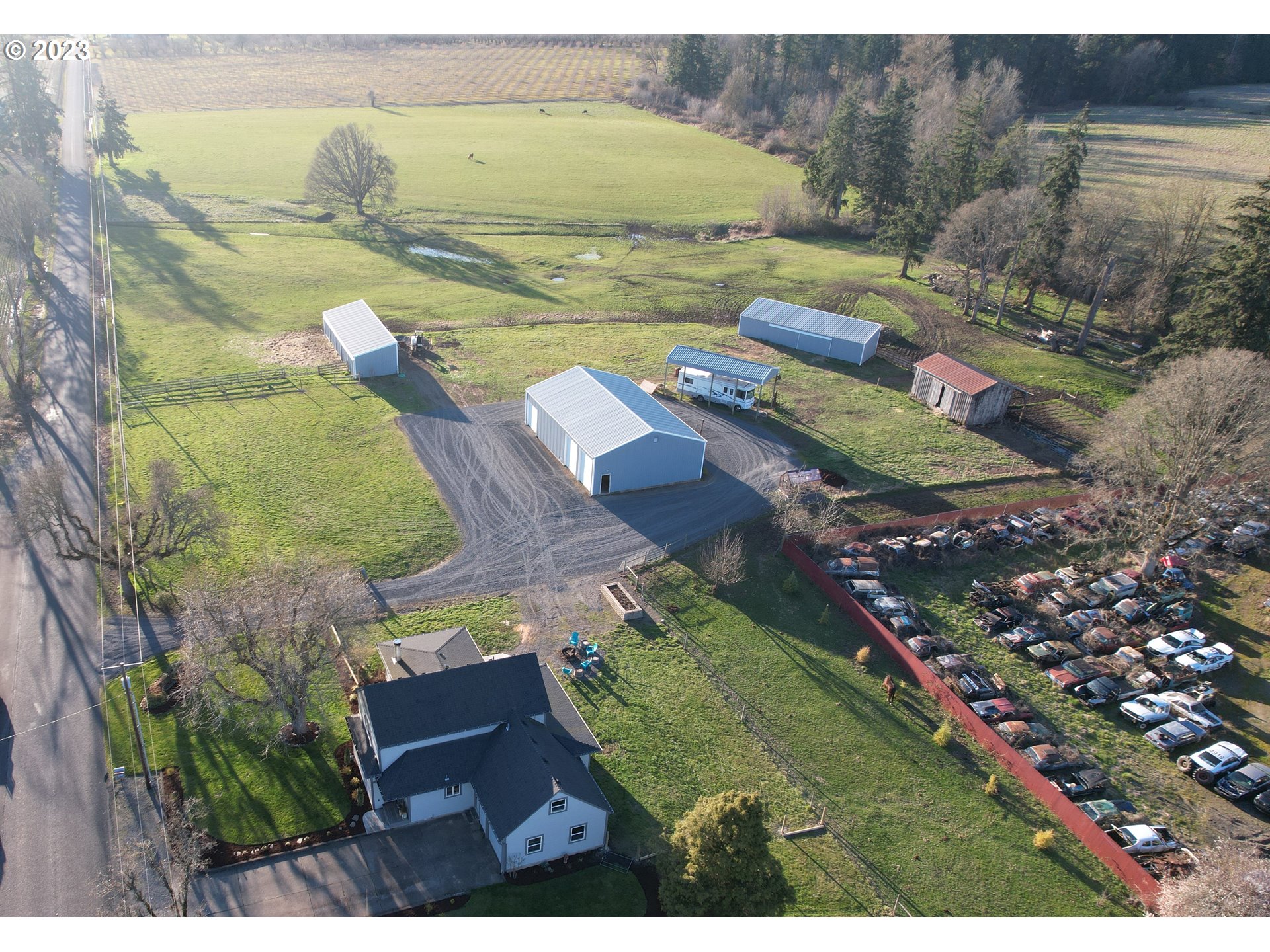 8951 South Schneider Road Canby, OR 97013 - Photo 30 of 39 an aerial view of a house with a garden