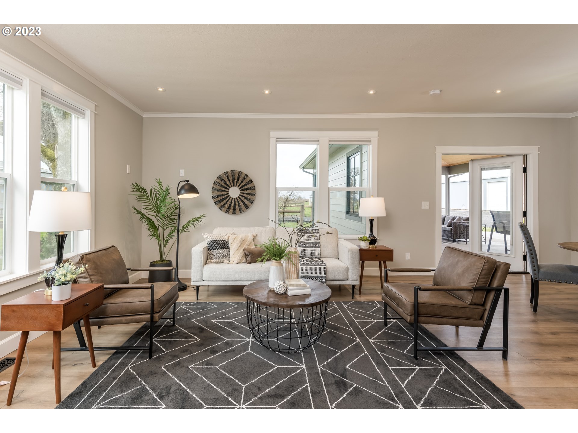 8951 South Schneider Road Canby, OR 97013 - Photo 3 of 39 a living room with furniture and a table