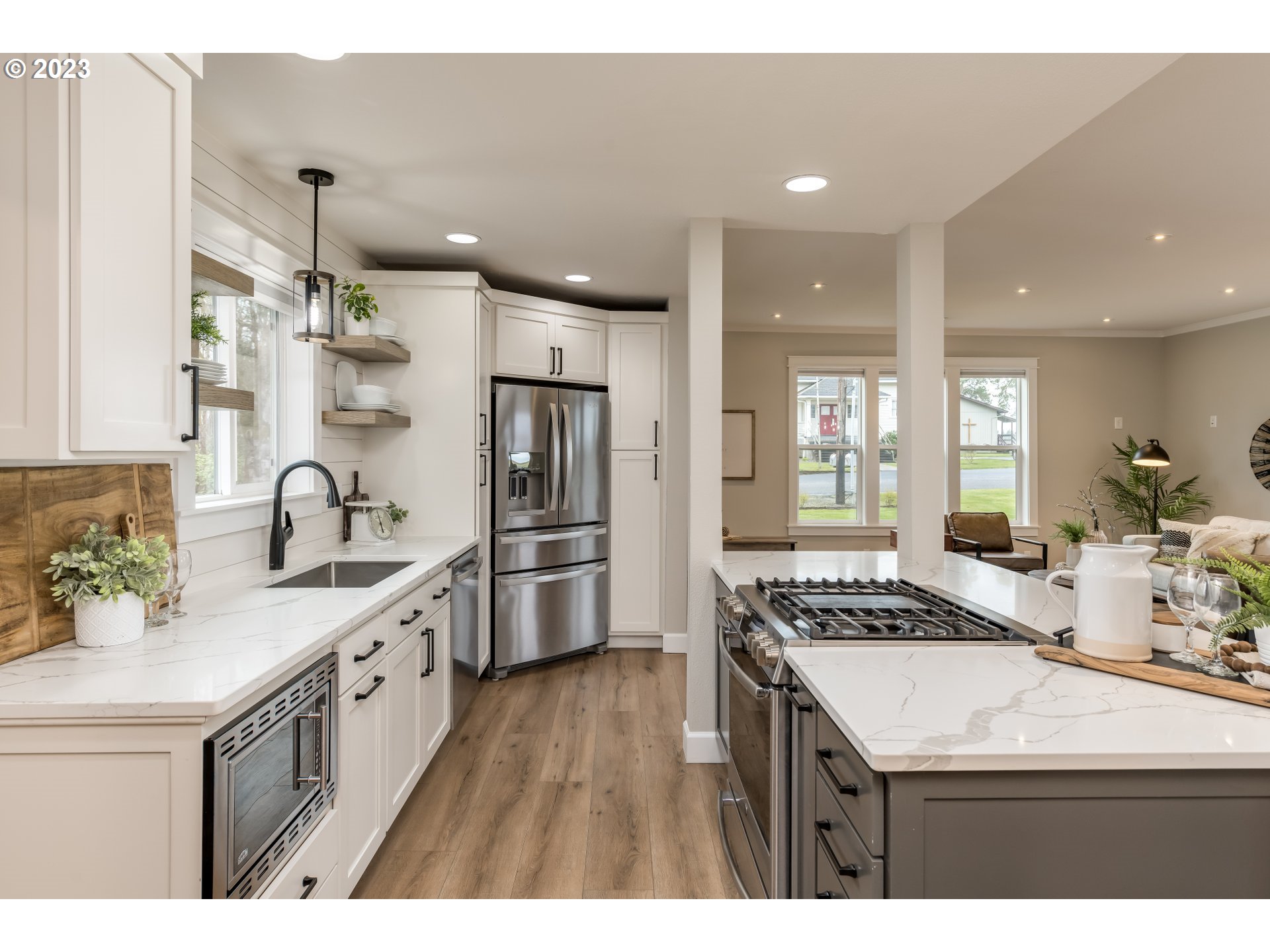 8951 South Schneider Road Canby, OR 97013 - Photo 8 of 39 a kitchen that has a sink a stove and cabinets