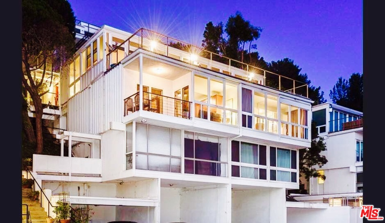 18125 Coastline Drive, Unit A Malibu, CA 90265 - Photo 2 of 9 a view of a building with a lot of windows