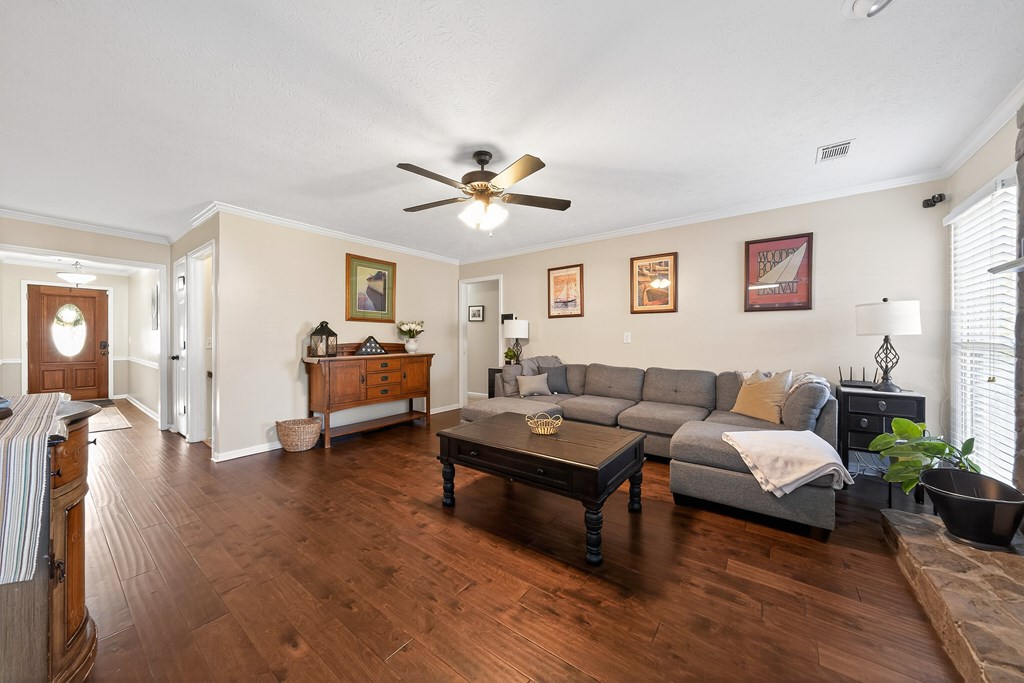 7333 Cedar Creek Loop Columbus, GA 31904 - Photo 5 of 37 a living room with furniture and wooden floor