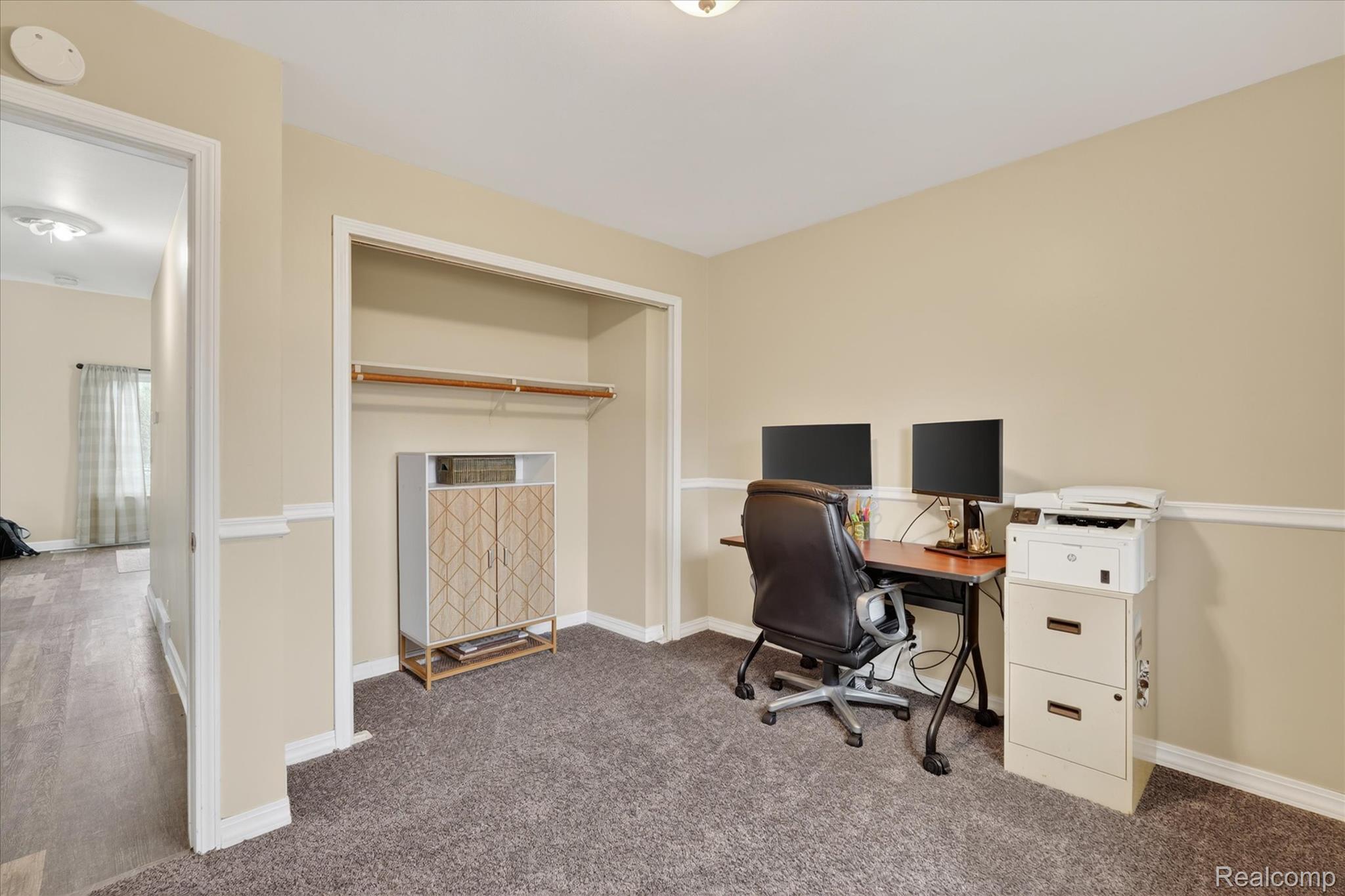 13508 North Center Road Clio, MI 48420 - Photo 29 of 38 Carpeted home office with baseboards