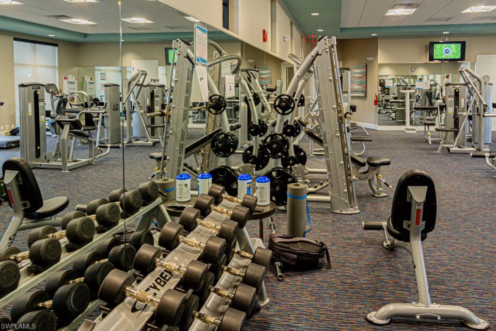 1869 Mustique Street Naples, FL 34120 - Photo 38 of 48 a view of a room with gym equipment