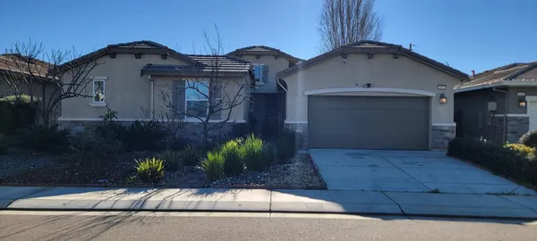 a house view with a outdoor space