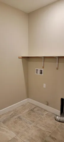 a view of a street with an outdoor seating