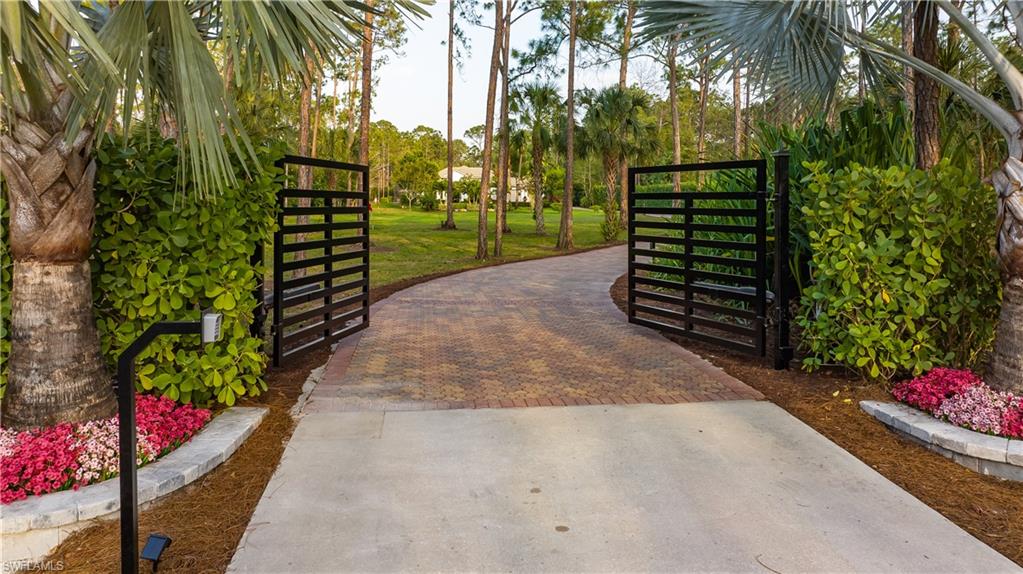 2360 19th Street Southwest Naples, FL 34117 - Photo 2 of 50 Gate with a yard
