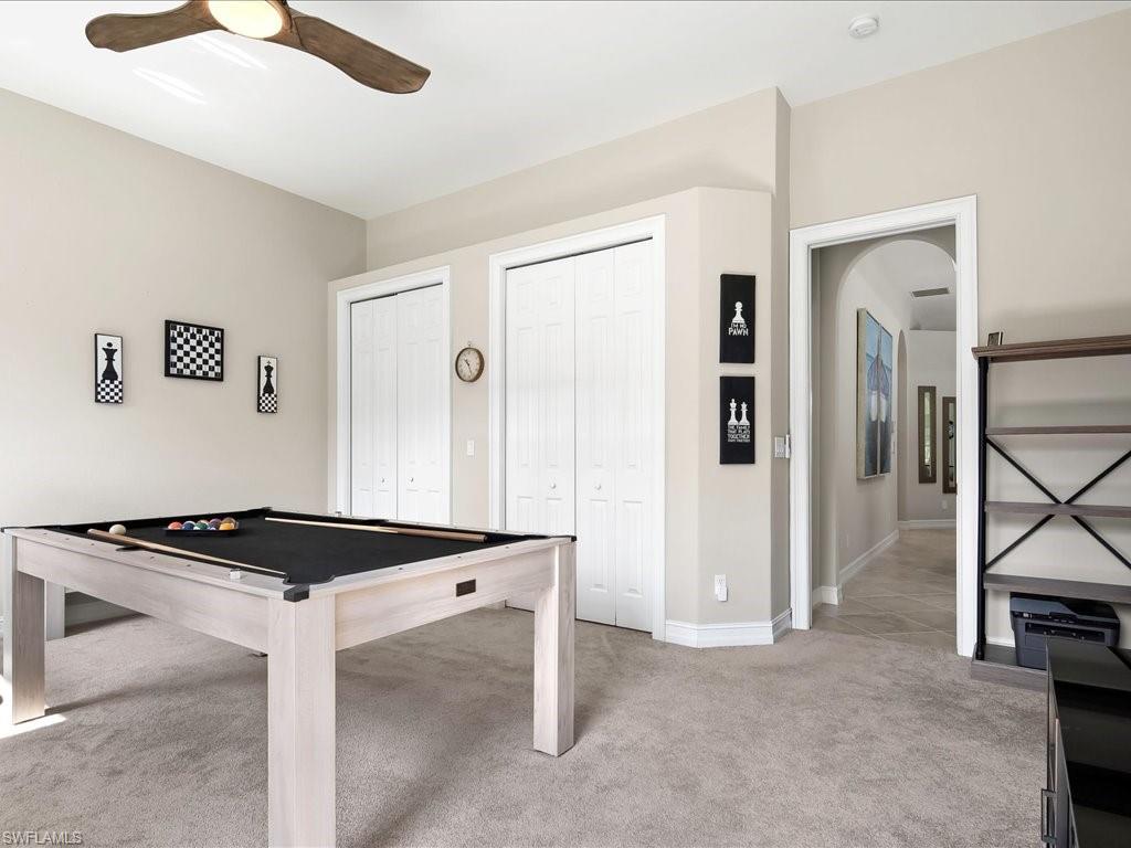 2360 19th Street Southwest Naples, FL 34117 - Photo 34 of 50 Game room featuring carpet flooring, ceiling fan, pool table, and baseboards