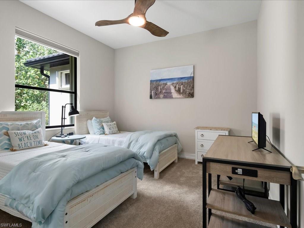 2360 19th Street Southwest Naples, FL 34117 - Photo 36 of 50 Bedroom featuring light carpet and ceiling fan