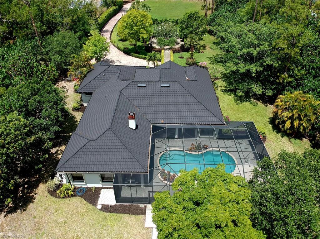 2360 19th Street Southwest Naples, FL 34117 - Photo 4 of 50 View of subject property with a pool