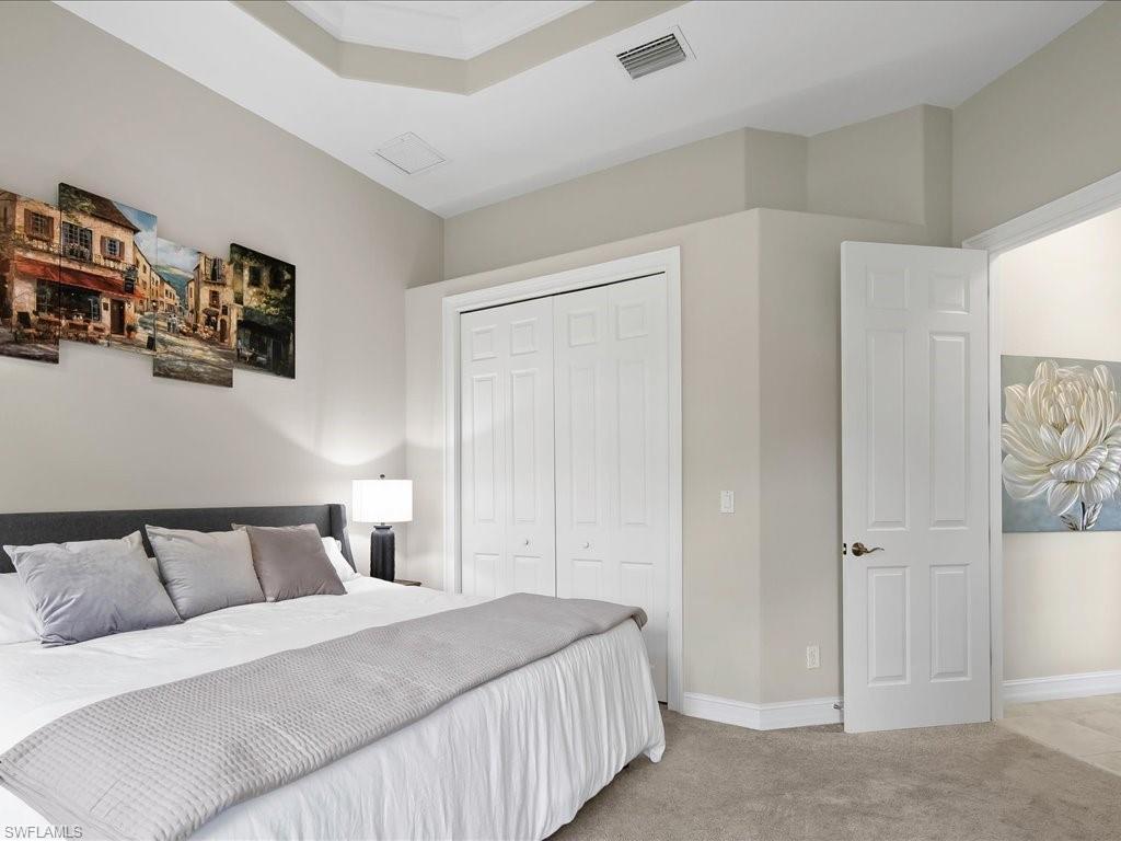 2360 19th Street Southwest Naples, FL 34117 - Photo 42 of 50 Carpeted bedroom with a closet and baseboards