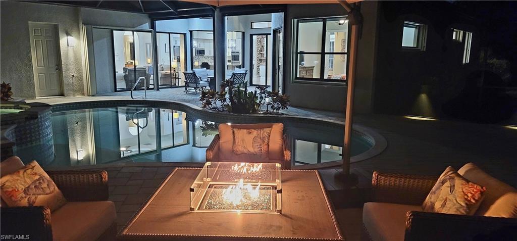 2360 19th Street Southwest Naples, FL 34117 - Photo 47 of 50 View of swimming pool with a pool with connected hot tub