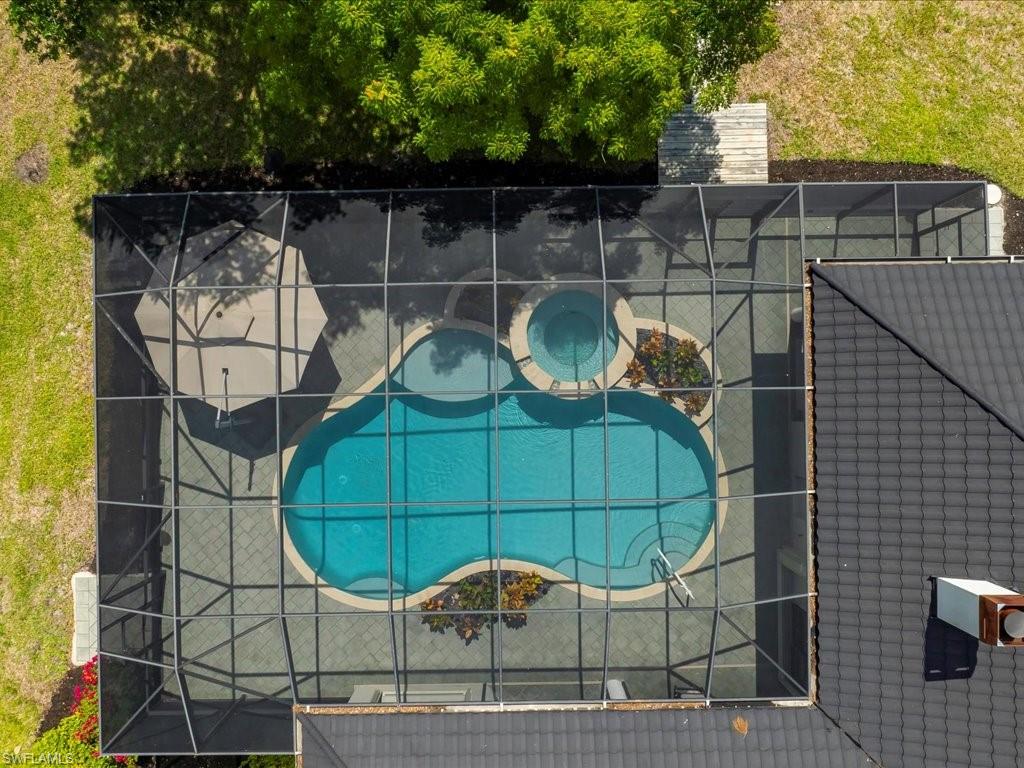 2360 19th Street Southwest Naples, FL 34117 - Photo 7 of 50 Aerial view of a pool area