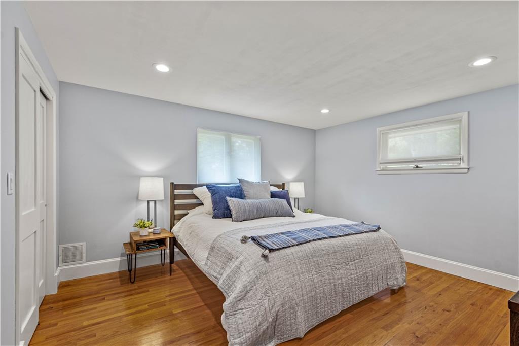 440 Miranda Road Pittsburgh, PA 15241 - Photo 15 of 45 a bedroom with a bed and a night stand