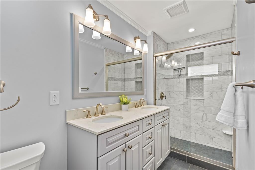 440 Miranda Road Pittsburgh, PA 15241 - Photo 18 of 45 a bathroom with a sink a toilet and shower