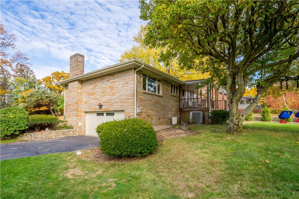 440 Miranda Road Pittsburgh, PA 15241 - Photo 41 of 45 a front view of a house with garden
