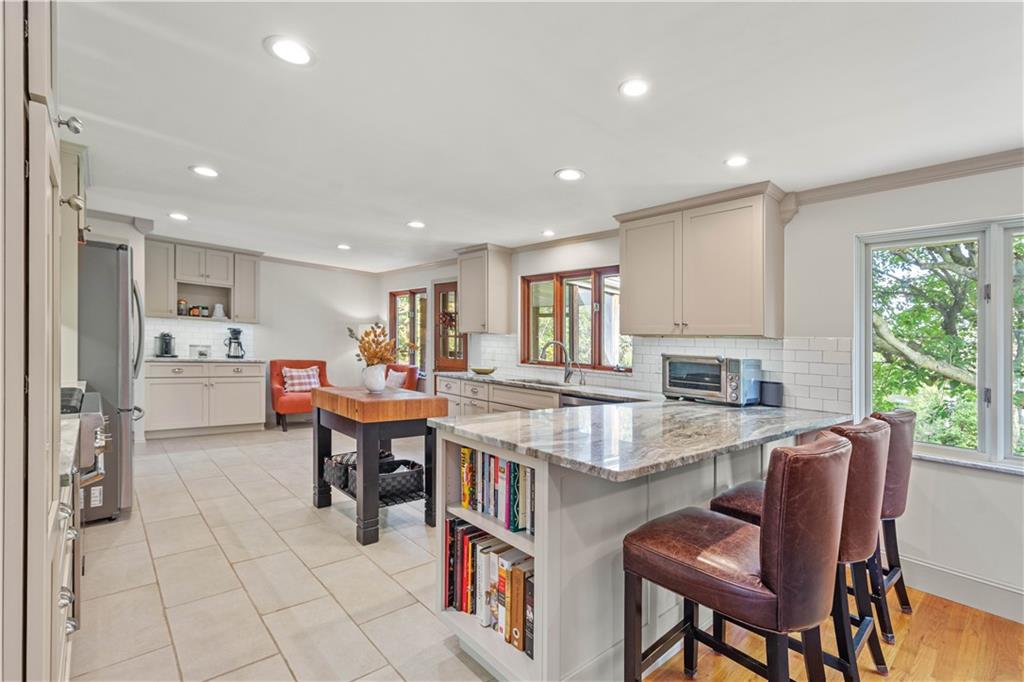 440 Miranda Road Pittsburgh, PA 15241 - Photo 8 of 45 a living room with stainless steel appliances granite countertop furniture and a kitchen