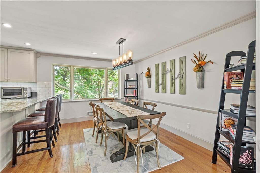 440 Miranda Road Pittsburgh, PA 15241 - Photo 10 of 45 a view of a dining room with furniture window and wooden floor