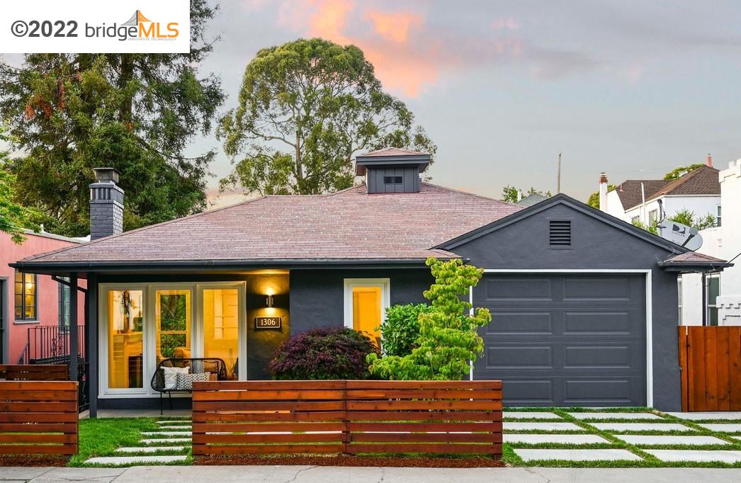 1306 Bates Road Oakland, CA 94610 - Photo 1 of 1 a front view of a house with garden