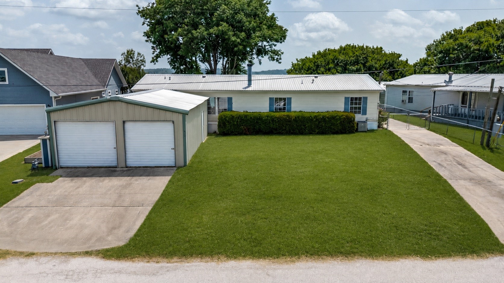 207 Vivian Road Onalaska, TX 77360 - Photo 2 of 34 a view of house and outdoor space