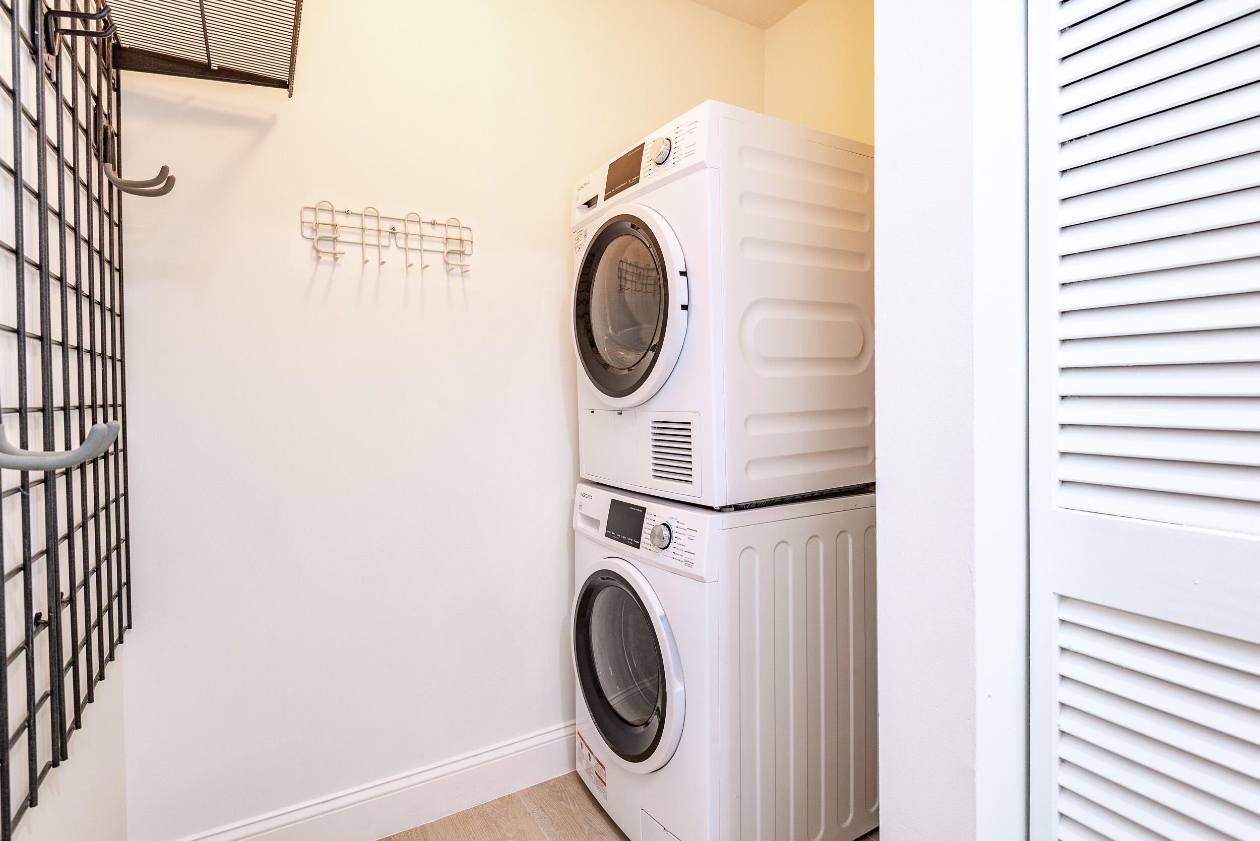 380 Northwest 67th Street, Unit J204 Boca Raton, FL 33487 - Photo 16 of 43 a utility room with dryer and washer