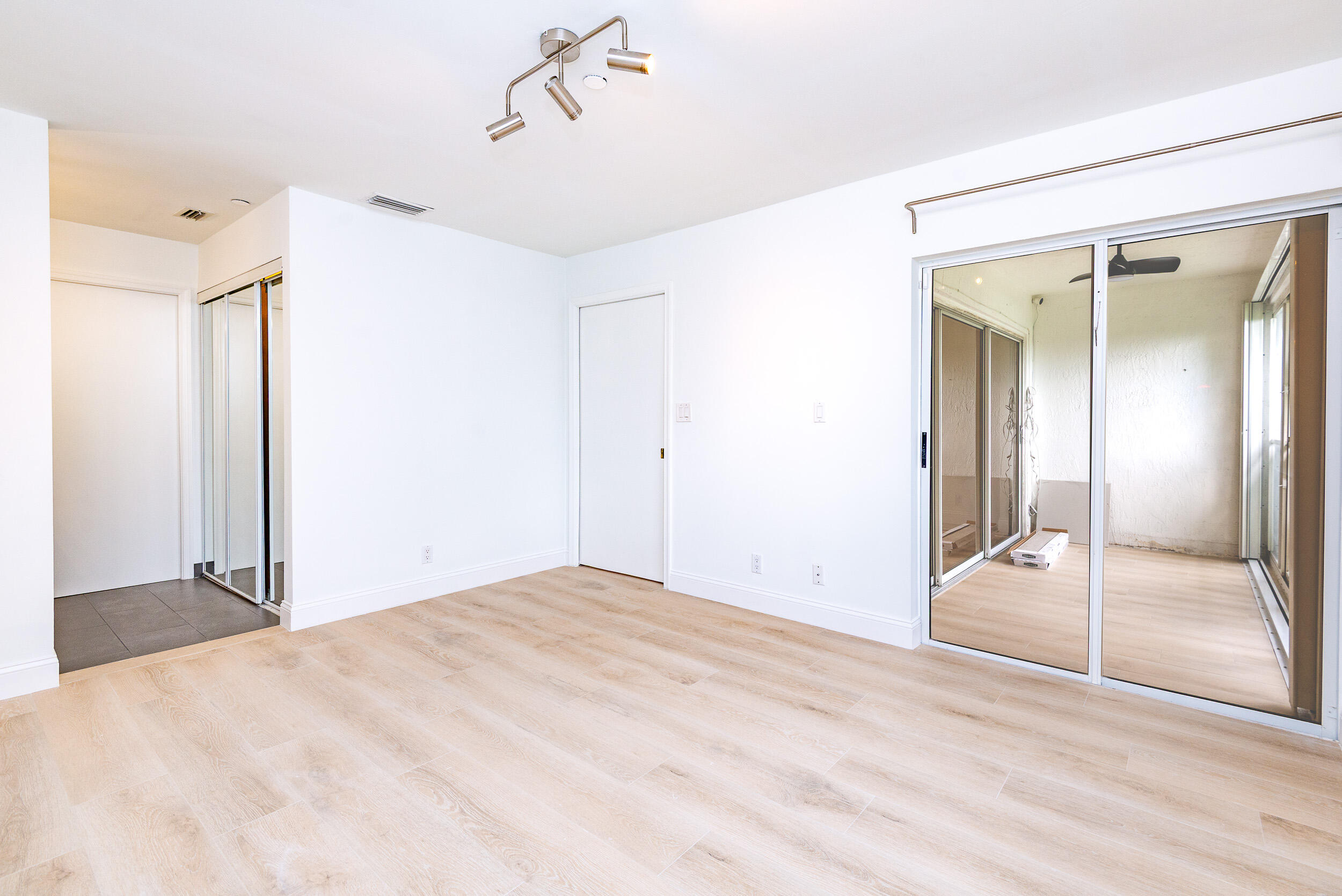 380 Northwest 67th Street, Unit J204 Boca Raton, FL 33487 - Photo 24 of 43 a view of empty room