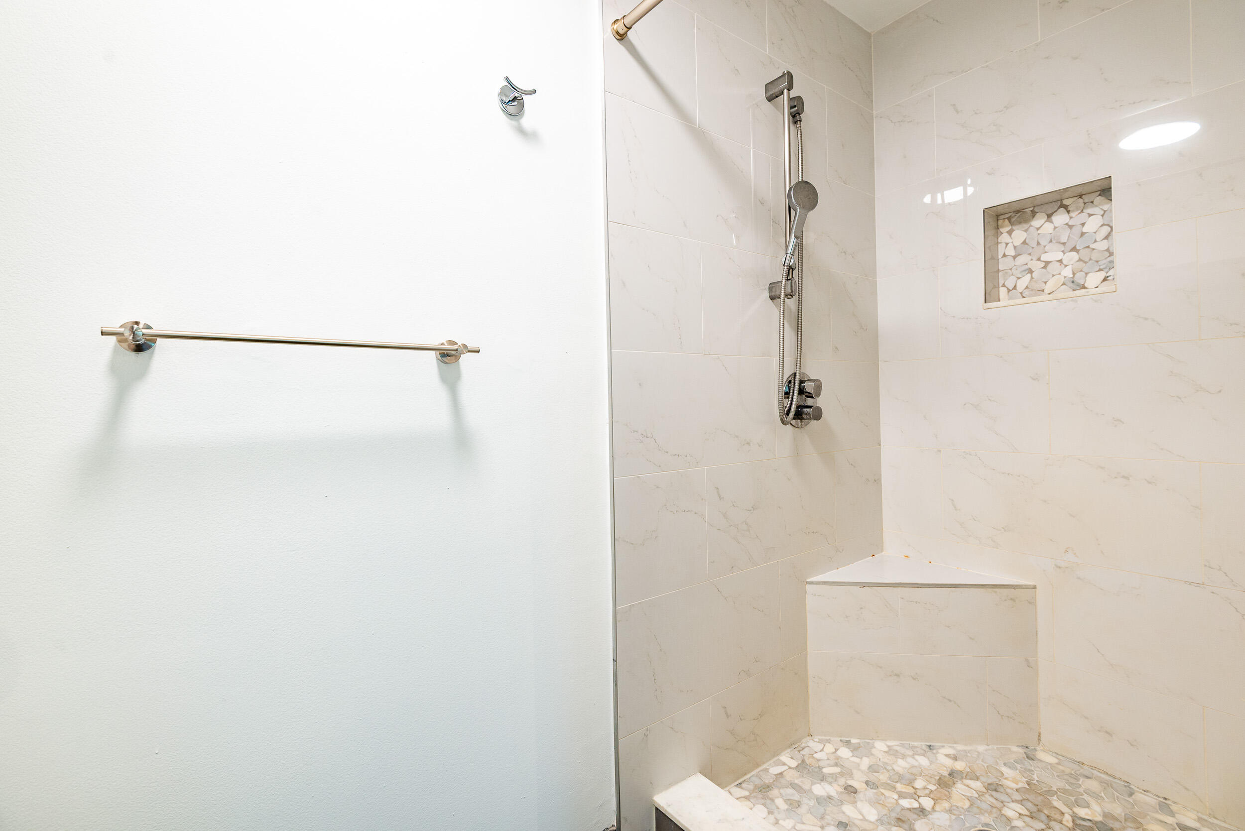 380 Northwest 67th Street, Unit J204 Boca Raton, FL 33487 - Photo 32 of 43 a bathroom with a shower