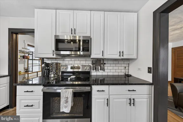 a view of a sink and a window