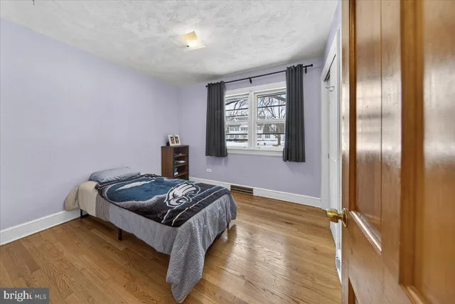 a white toilet sitting next to a bathroom