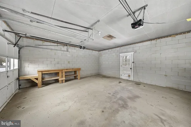 a view of a dinning table and chairs in patio
