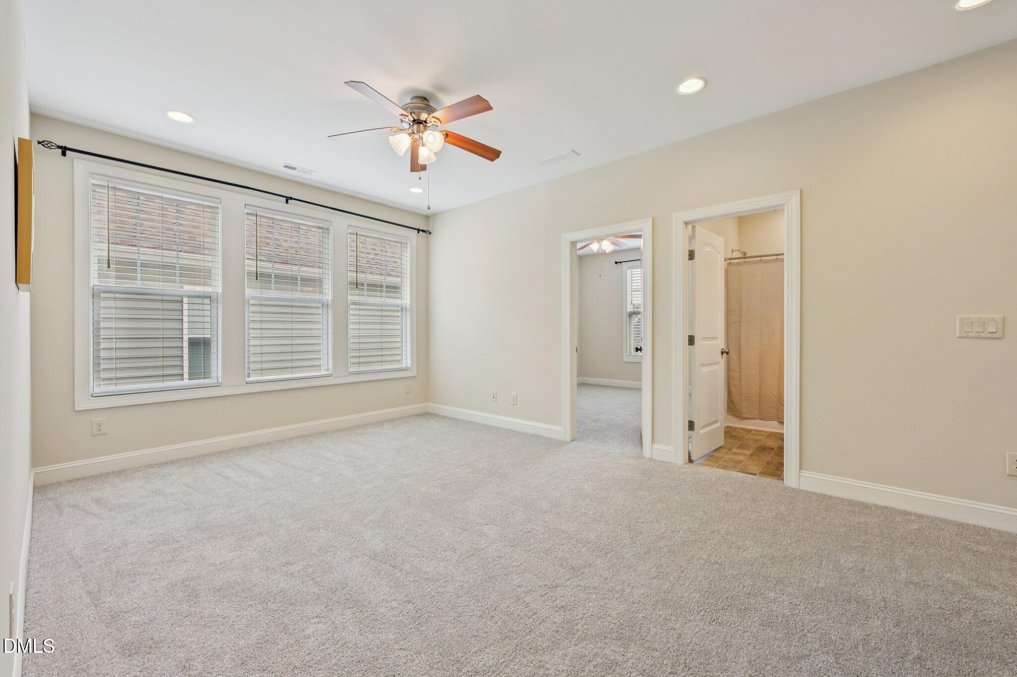 316 Rapport Drive Cary, NC 27519 - Photo 25 of 60 a view of an empty room with a window