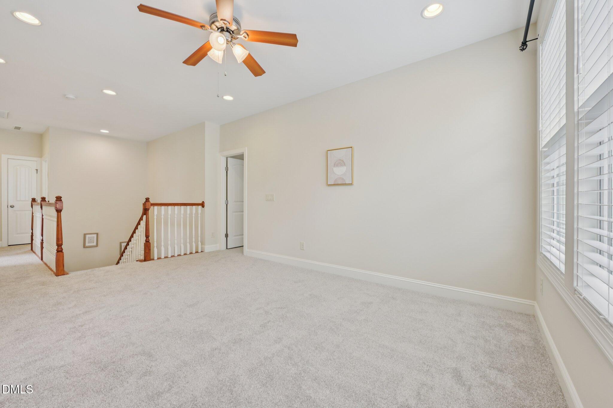 316 Rapport Drive Cary, NC 27519 - Photo 27 of 60 a view of an empty room with a window