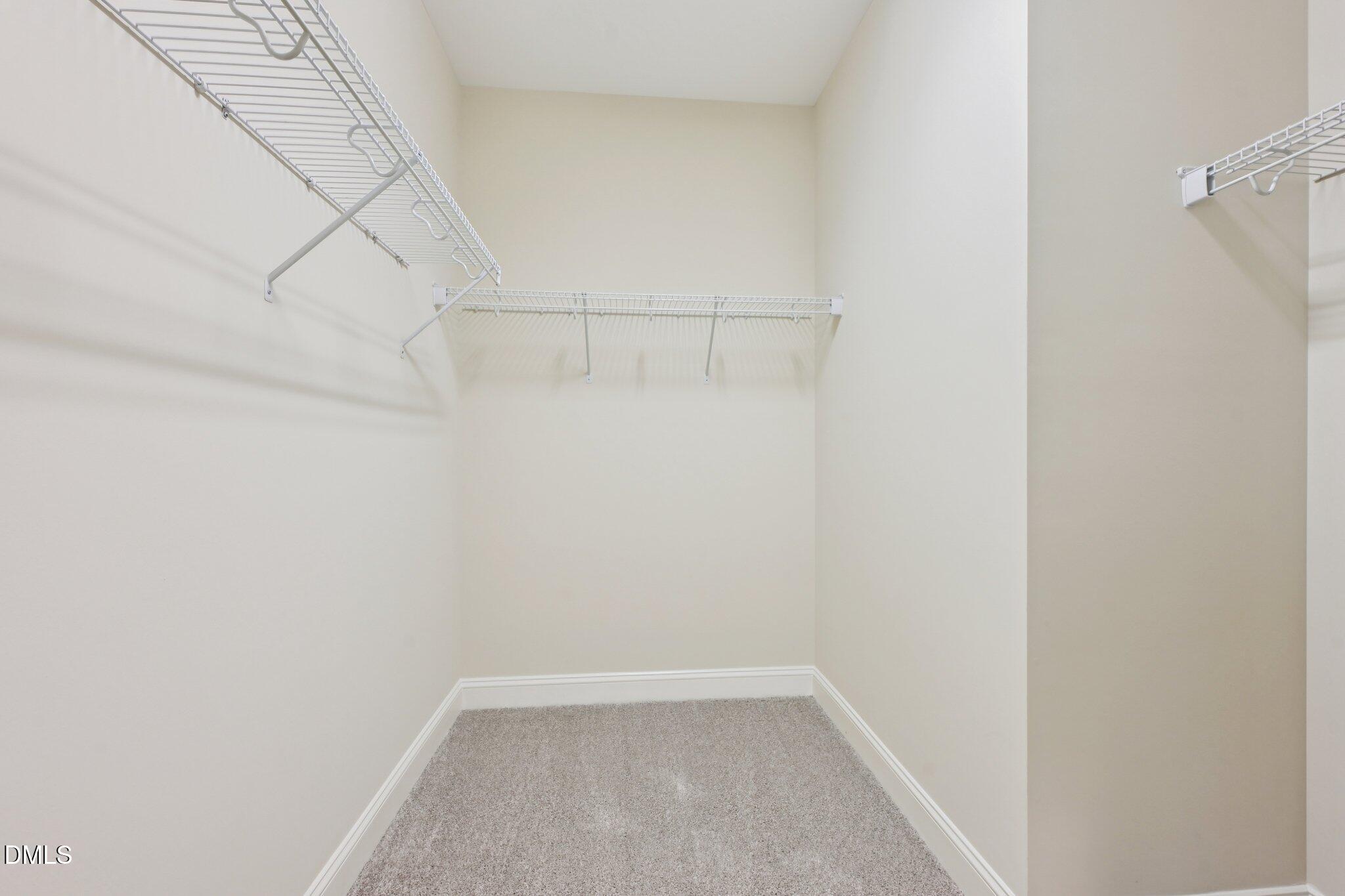 316 Rapport Drive Cary, NC 27519 - Photo 35 of 60 a view of a room with racks on the wall