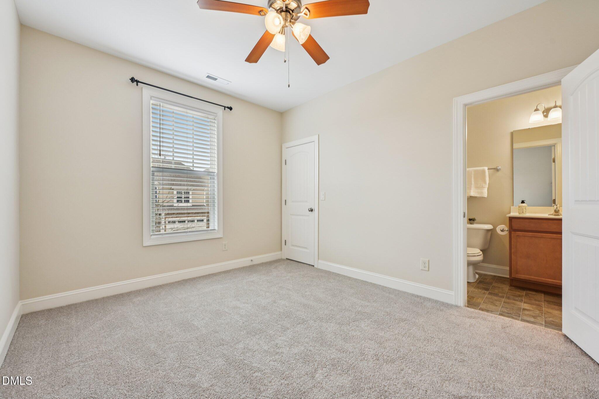 316 Rapport Drive Cary, NC 27519 - Photo 38 of 60 an empty room with a bathroom and a sink