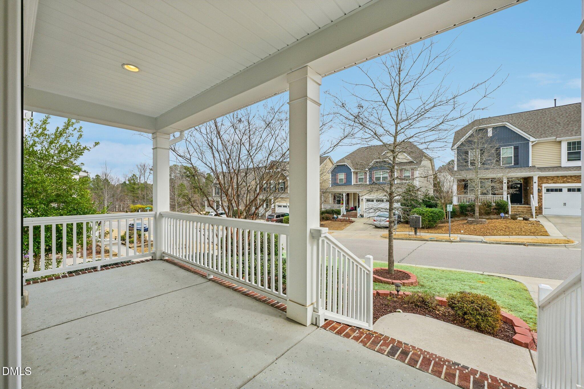 316 Rapport Drive Cary, NC 27519 - Photo 3 of 60 a view of a house with porch and wooden floor