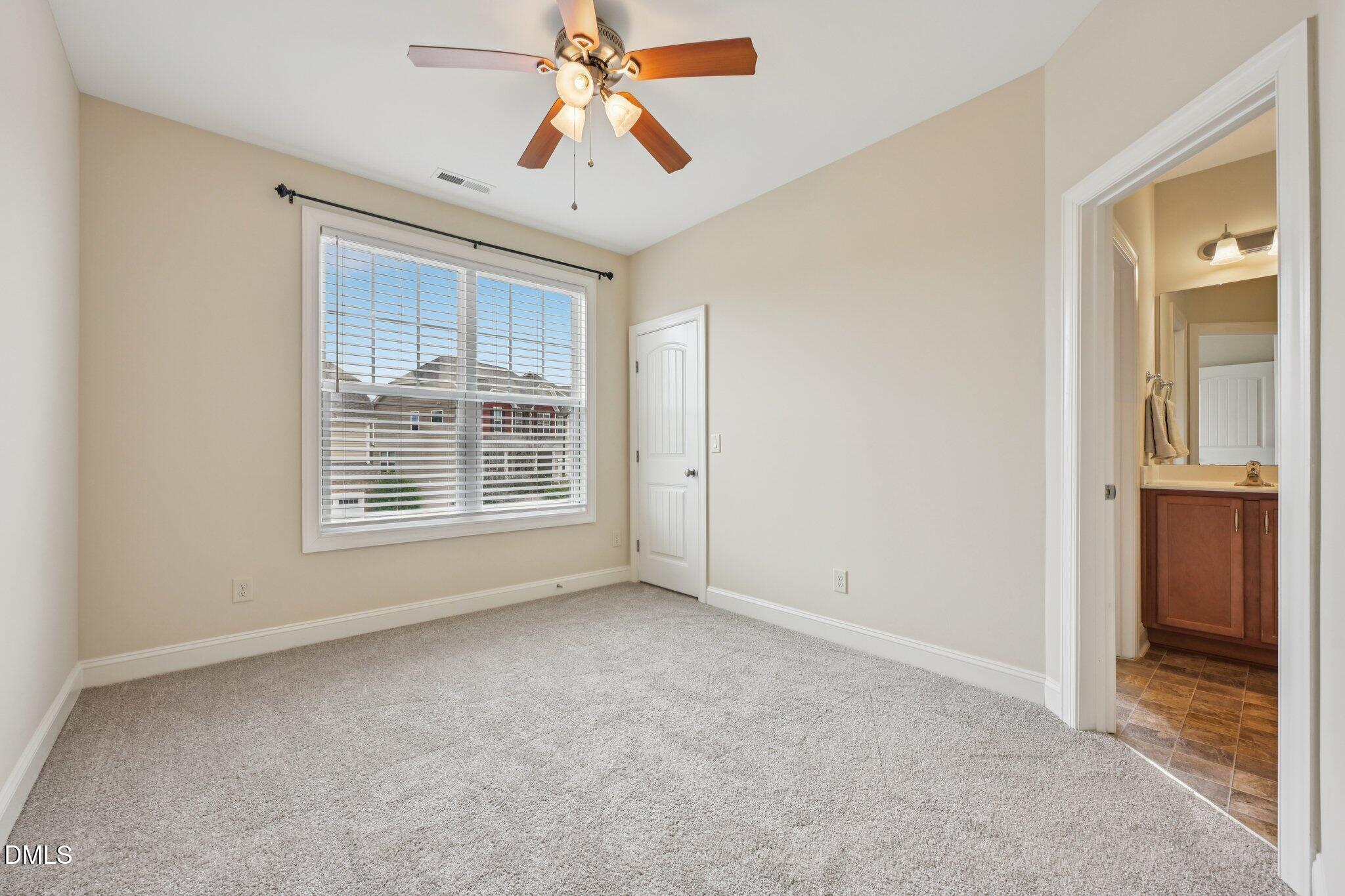 316 Rapport Drive Cary, NC 27519 - Photo 42 of 60 a view of an empty room with a window
