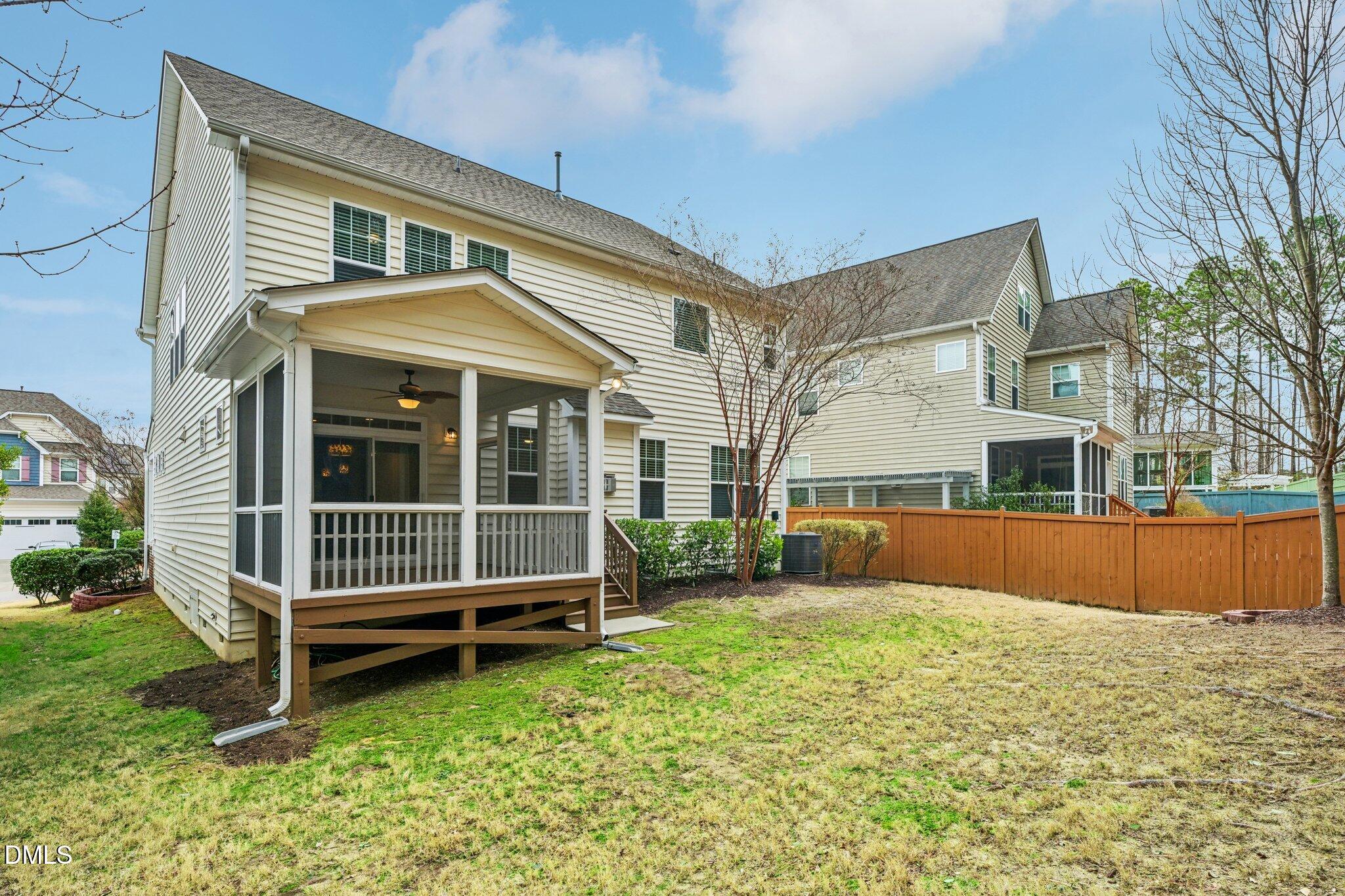 316 Rapport Drive Cary, NC 27519 - Photo 56 of 60 a view of a house with a yard