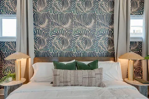 a view of a door and chair in the patio