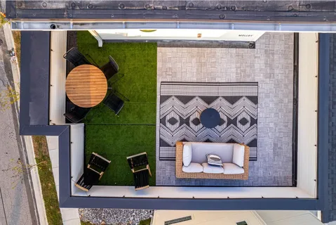 a view of a terrace with chairs