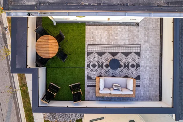 a view of a terrace with chairs