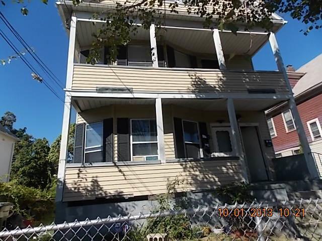 643 Central Avenue Bridgeport, CT 06607 - Photo 1 of 1 a view of a house with a patio