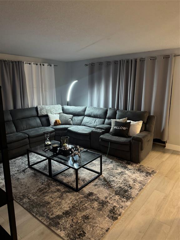 4174 Inverrary Drive, Unit 401 Lauderhill, FL 33319 - Photo 3 of 15 a living room with furniture and a window