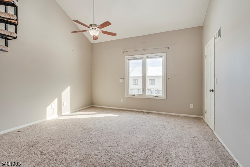 223 Cherokee Road Lafayette, NJ 07848 - Photo 12 of 36 a view of an empty room with a window