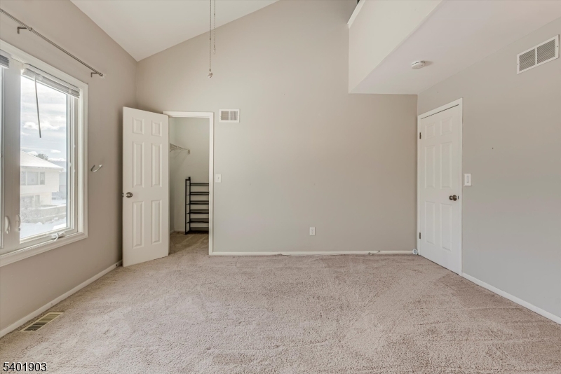 223 Cherokee Road Lafayette, NJ 07848 - Photo 14 of 36 an empty room with windows
