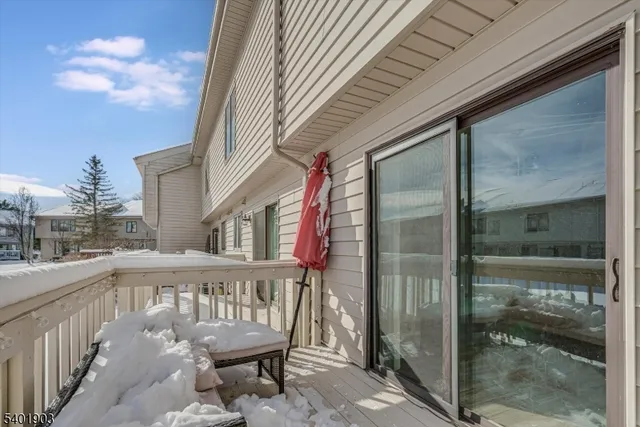 a view of swimming pool with seating space