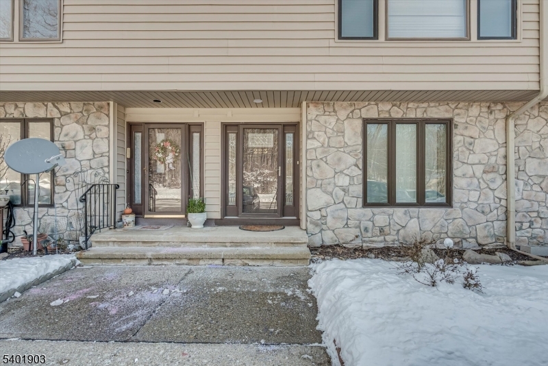 223 Cherokee Road Lafayette, NJ 07848 - Photo 3 of 36 a bathroom with a granite countertop sink and a mirror